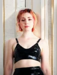 Latex bra with silver/gold hardware and o-ring detail