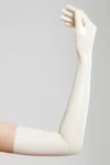 Long gloves made of molded latex in natural translucent color